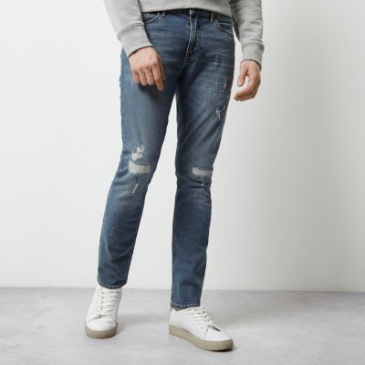 Mid blue wash ripped skinny Sid jeans